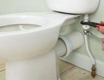 Do-it-yourself repair of the toilet cistern flush mechanism with a button Repair of the toilet cistern valve with a button